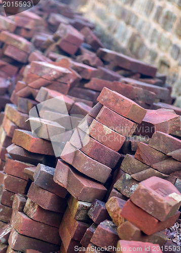 Image of Stack of unusual shaped hand made bricks