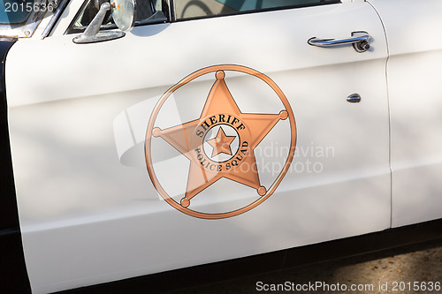 Image of Vintage police car detail on door