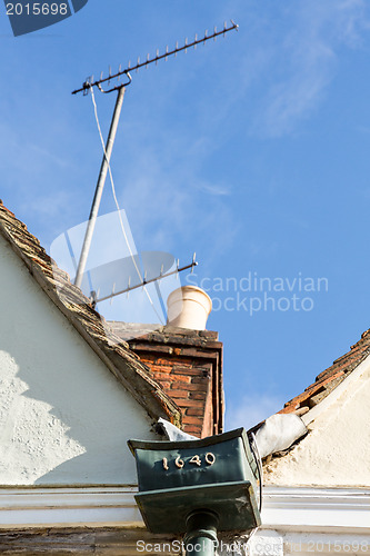 Image of Contrast between old and new on roof