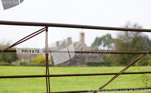Image of White private sign on farm gate 