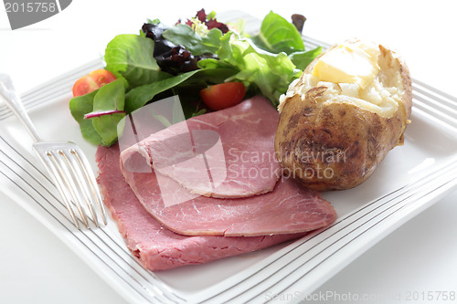 Image of Corned beef with salad and potato