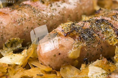 Image of Roasted sausages with sauerkraut - polish dish