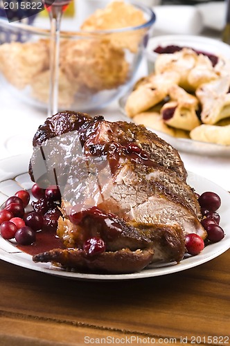 Image of Delicious Scrambled Grilled meat with cranberry sauce 