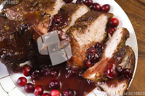 Image of Delicious Scrambled Grilled meat with cranberry sauce 