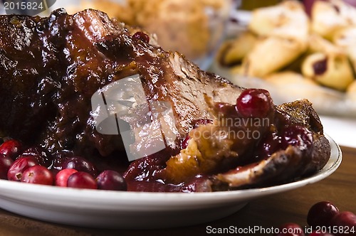 Image of Delicious Scrambled Grilled meat with cranberry sauce 