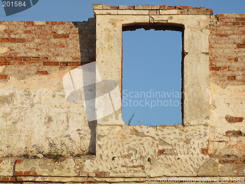 Image of Window in crumbling brick wall