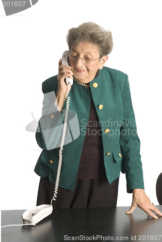 Image of business woman mature on phone