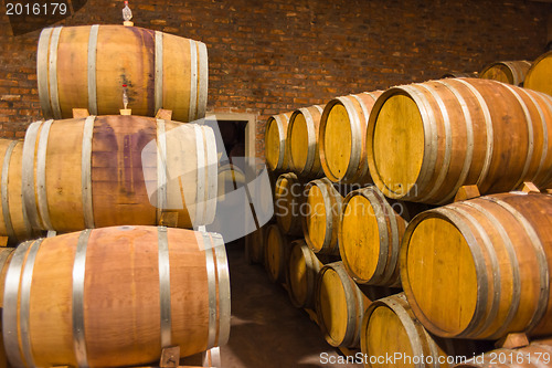 Image of Wine barrels in rows