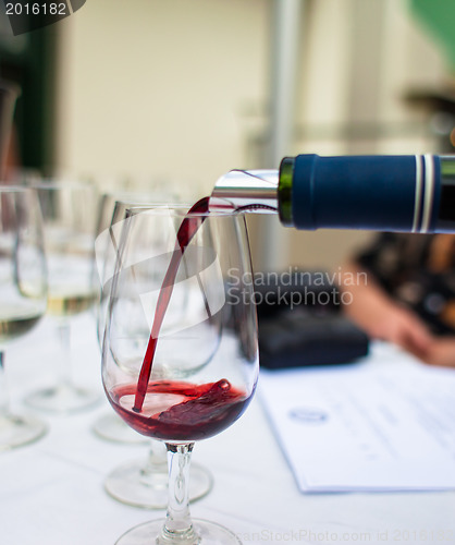 Image of Pouring red wine