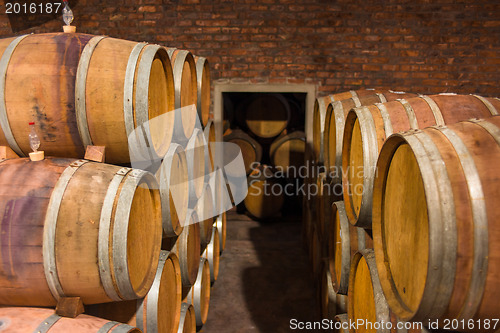 Image of Wine barrels in rows