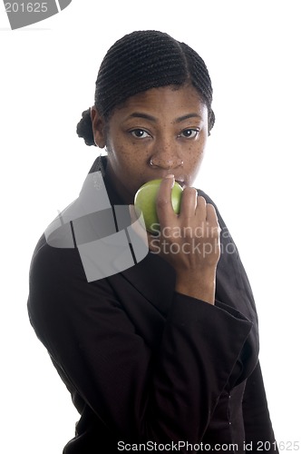 Image of pretty black woman eating apple