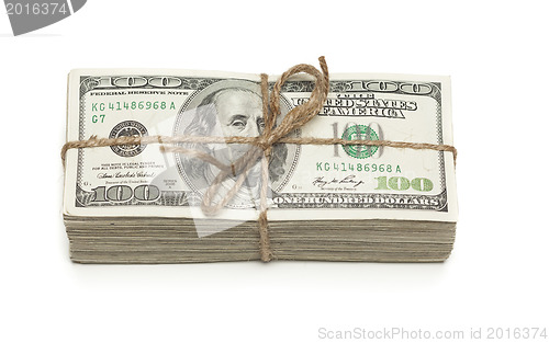 Image of Stack of One Hundred Dollar Bills Tied in a Burlap String on Whi