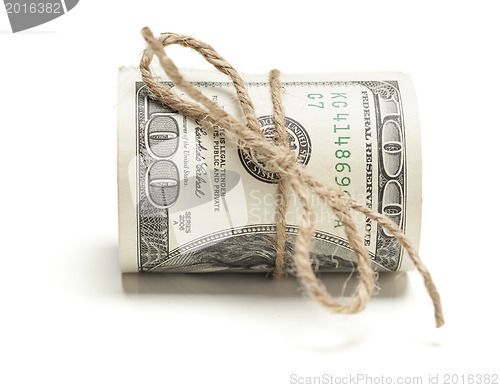 Image of Roll of One Hundred Dollar Bills Tied in Burlap String on White