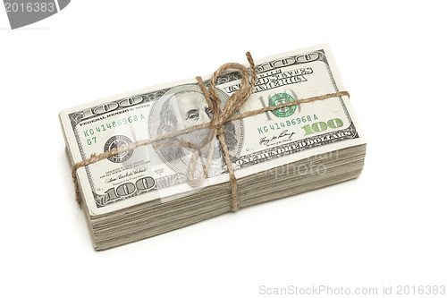 Image of Stack of One Hundred Dollar Bills Tied in a Burlap String on Whi