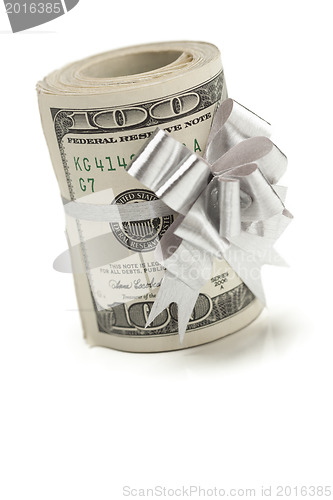 Image of Roll of One Hundred Dollar Bills Tied Silver Bow on White