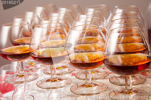 Image of glasses of cognac on  festive table