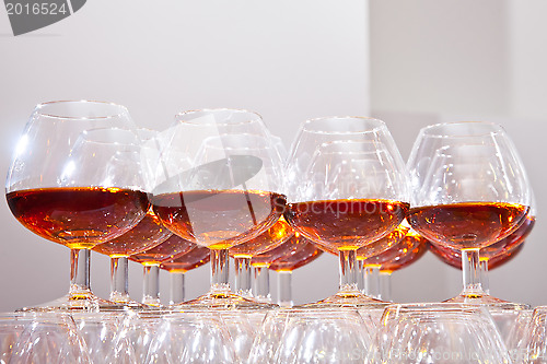 Image of glasses of cognac on  festive table