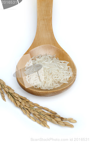 Image of Basmati rice in wooden spoon 
