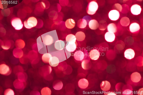 Image of Holiday shiny red blurry lights 