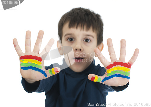 Image of Boy hands painted with colorful paint