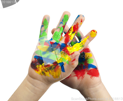 Image of Boy hands painted with colorful paint