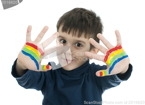 Image of Boy hands painted with colorful paint