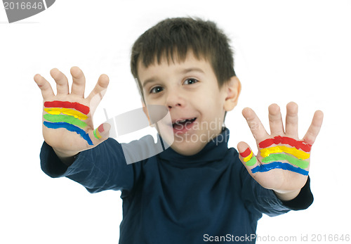 Image of Boy hands painted with colorful paint