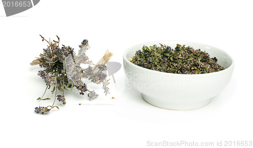 Image of Dried thyme in a bowl and thyme twigs