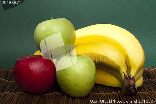 Image of Red and green apples and bananas