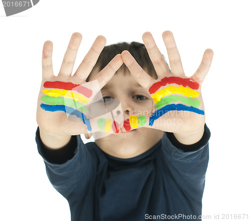 Image of Boy hands painted with colorful paint