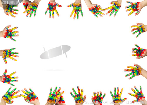 Image of Boy hands painted with colorful paint
