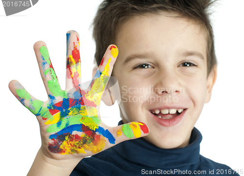 Image of Boy hands painted with colorful paint