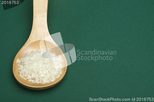 Image of Rice baldo in wooden spoon 