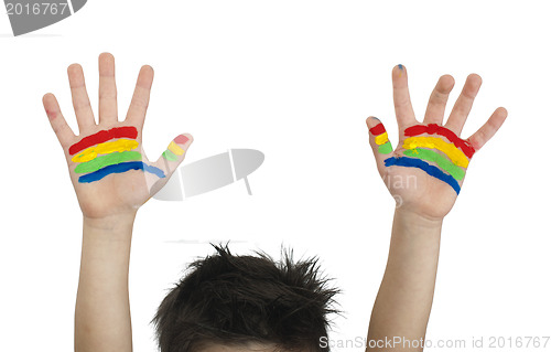 Image of Boy hands painted with colorful paint