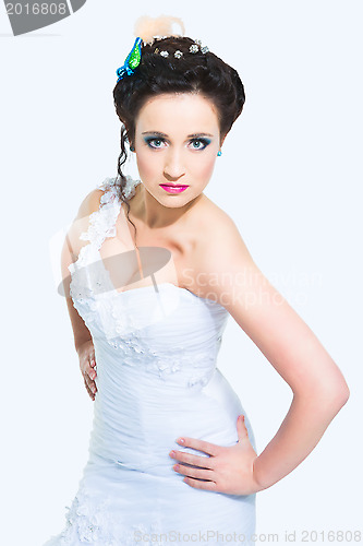 Image of beautiful girl in long white wedding dress