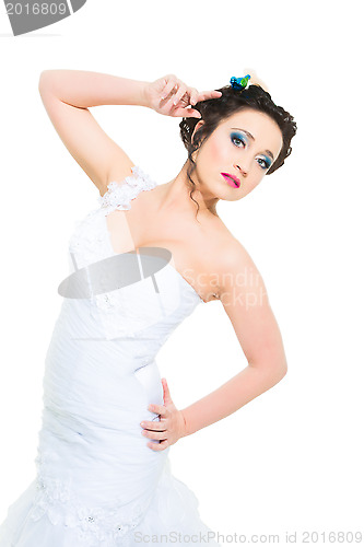 Image of beautiful girl in long white wedding dress