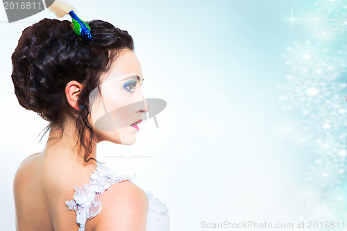 Image of beautiful girl in long white wedding dress