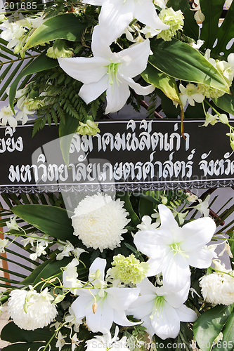 Image of Flowers left by mourners