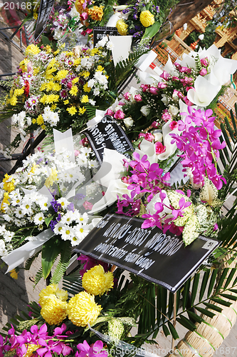 Image of Flowers left by mourners