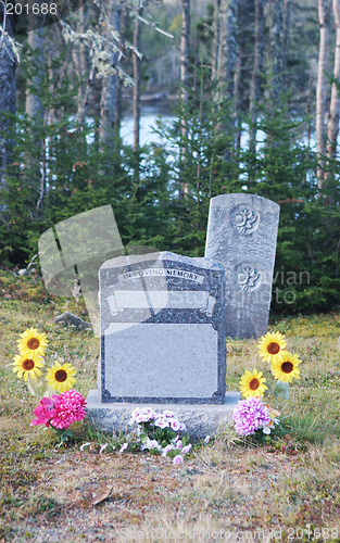 Image of Gravestone with sunflowers