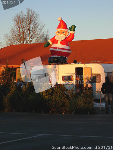 Image of Norwegian farmer selling christmastrees