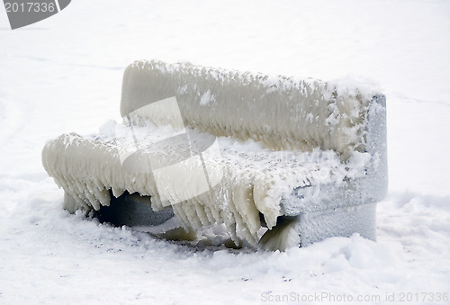 Image of Bench covered with ice 