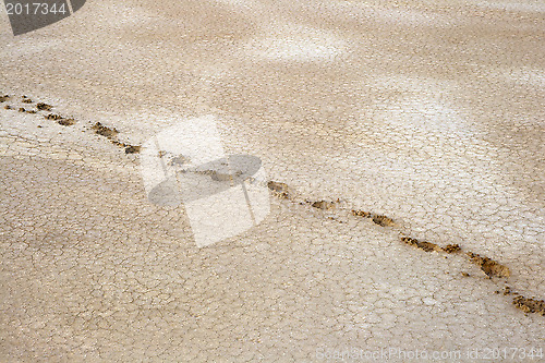 Image of Salty land and footprints