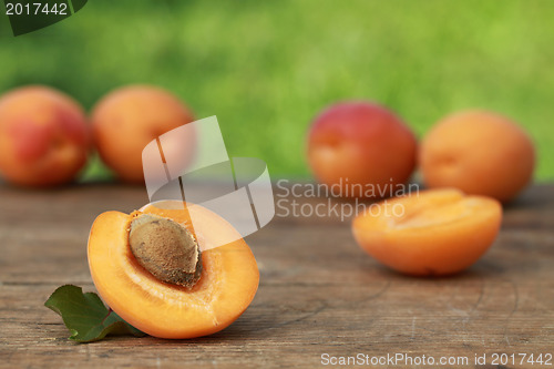 Image of Apricots on a wooden table