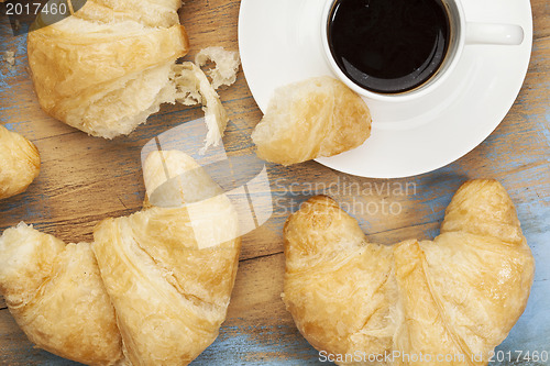 Image of croissant and coffee