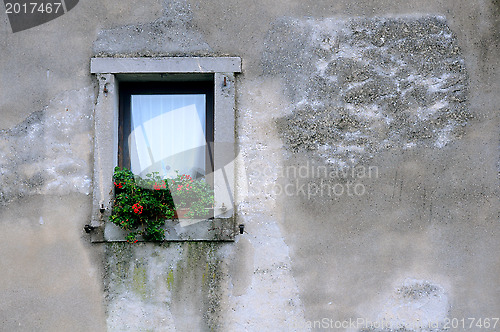 Image of Window on the Shabby House Wall