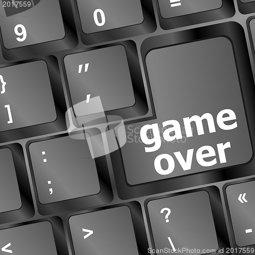 Image of Computer keyboard with game over key - technology background