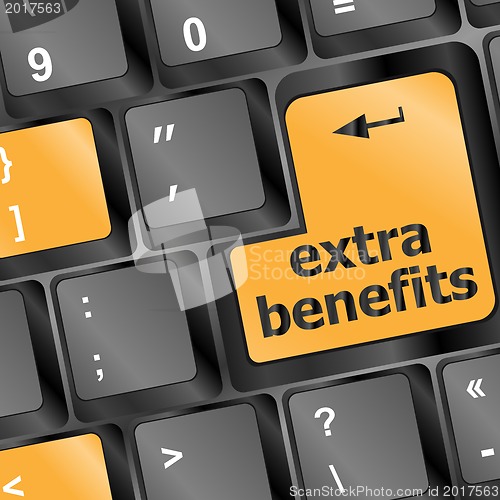 Image of extra benefits button on keyboard - business concept