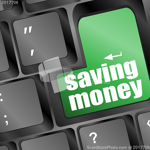 Image of saving money for investment with a button on computer keyboard