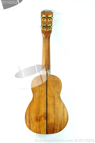 Image of closeup shoot of wooden ukulele 